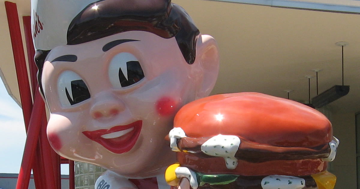 Frisch's Big Boy statue holding a large burger outside a restaurant in Columbus, Ohio