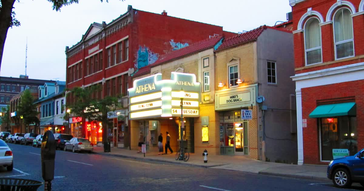 Athena Theatre marquee at dusk in Athens, Ohio