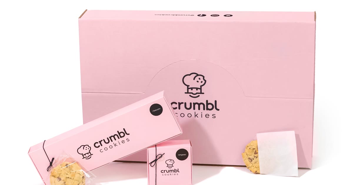 Crumbl Cookies pink boxes and cookies