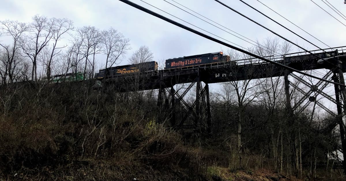 Wheeling and Lake Erie Railway train crossing a bridge