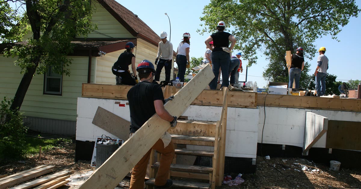 Habitat for Humanity volunteers building a home