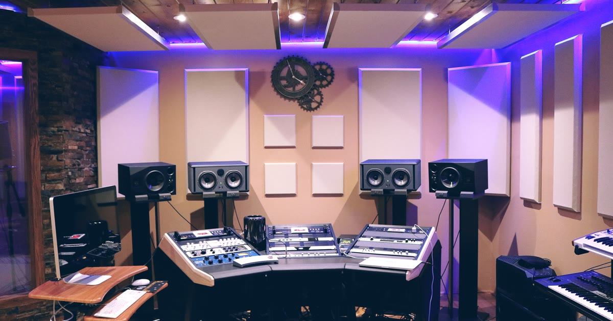 Recording studio control room with mixing consoles and studio monitors