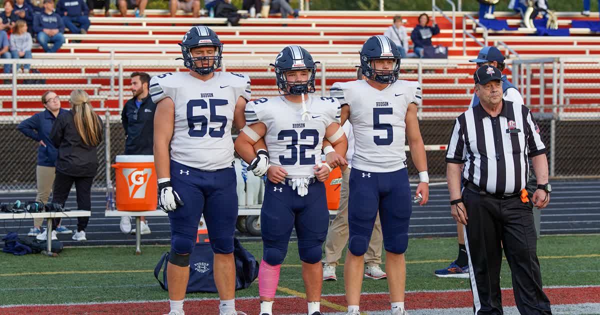 Hudson High School football players on the field