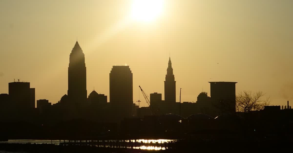 Cleveland skyline at sunrise seen from Edgewater Park