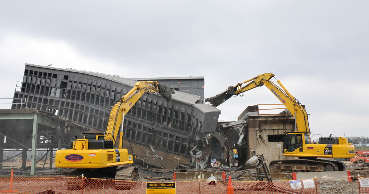 Excavators demolishing a structure at the Portsmouth Site