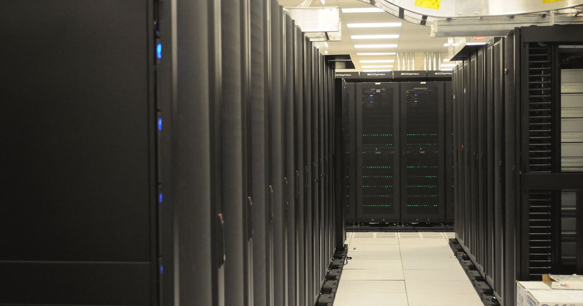 Rows of server racks inside a data center