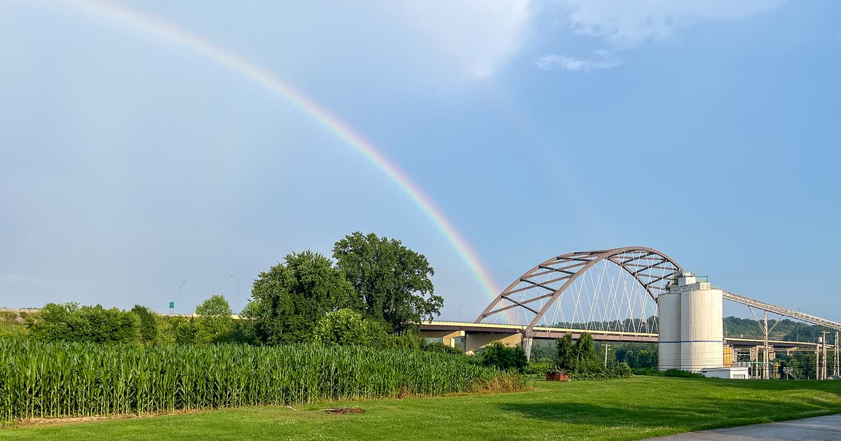 The Blennerhassett Island Bridge over the Ohio River at Belpre Ohio under a rainbow