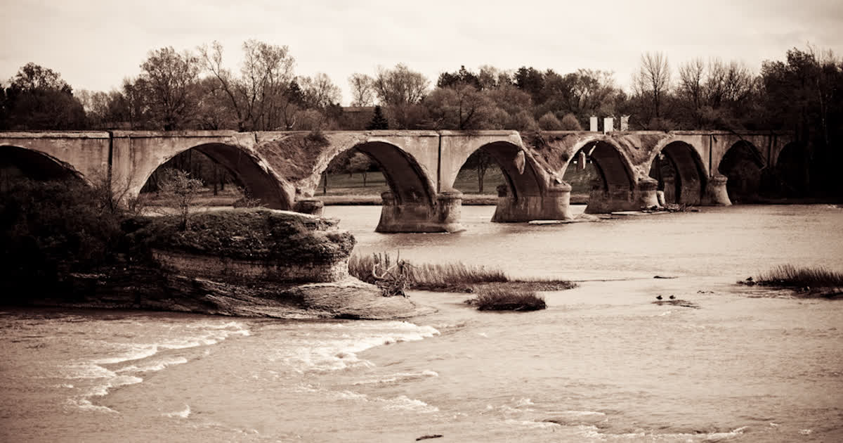 The Roche de Boeuf Interurban Bridge arches over the Maumee River at Waterville