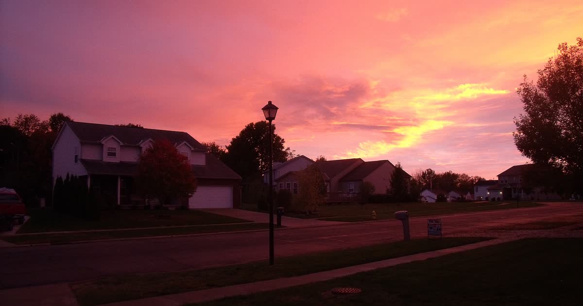 Residential street in Heath, Ohio at sunset