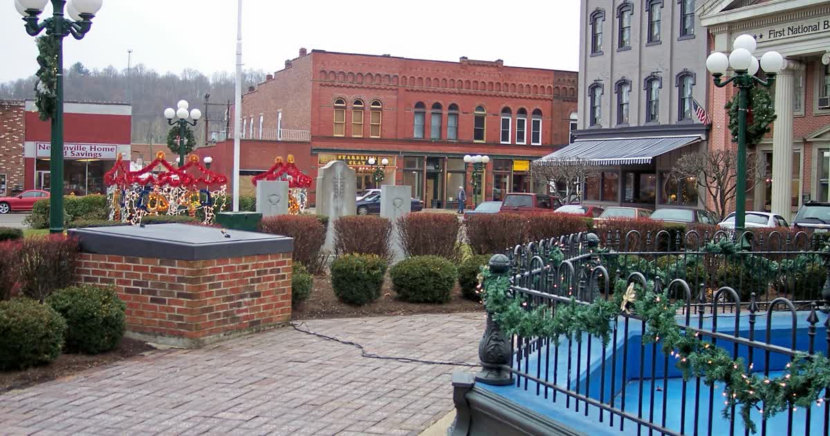Nelsonville's Public Square in Athens County, Ohio, with brick storefronts and the First National Bank building