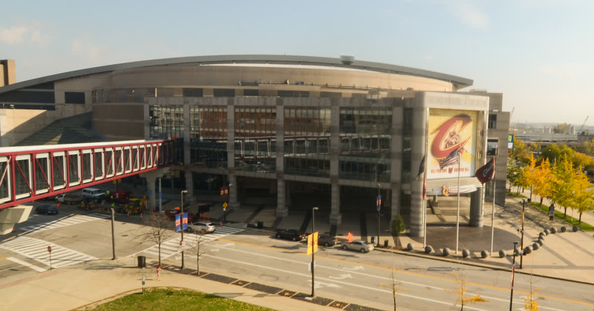 The Cavaliers' home arena in downtown Cleveland, with the team's banner on the building