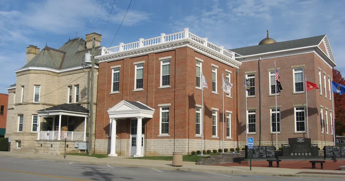 The Highland County Courthouse complex in downtown Hillsboro, Ohio, brick buildings with flags