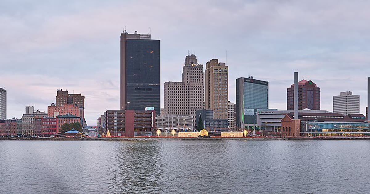 The Toledo, Ohio skyline across the Maumee River at dusk